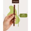 Ukážka dĺžky sušeného črievka pre psov značky Panakei, ktoré meria približne 15 centimetrov.